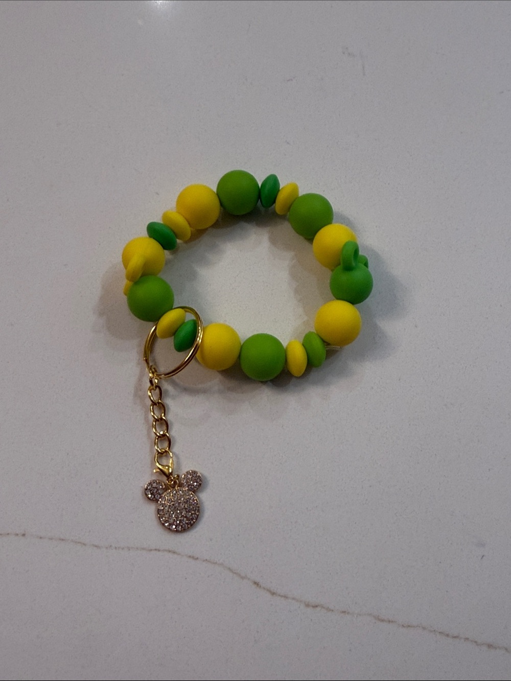 Tinkerbell yellow and green colored  silicone beaded wristlet